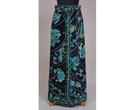A 1960'S 'EMILIO PUCCI' VELVET MAXI SKIRT. A pencil lined black cotton velveteen maxi skirt with psychedelic, art deco turquo