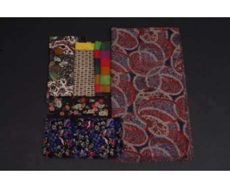 A COLLECTION OF VINTAGE LIBERTY SCARF AND FLORAL SHAWLS A collection of scarves to include a liberty scarf. (5)