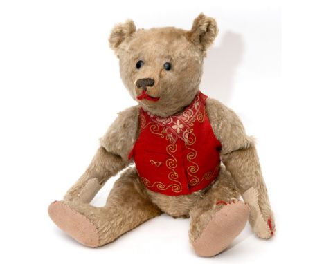 EARLY STEIFF TEDDY BEAR circa 1912, with black boot button eyes, elongated limbs and hump back. With a growler mechanism (no 