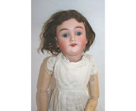 MAX HANDWERCK DOLL with weighted blue eyes and open mouth. Marked, Max Handwerck, 283/28,5, Germany, 2 1/4. 22ins (56cms) hig