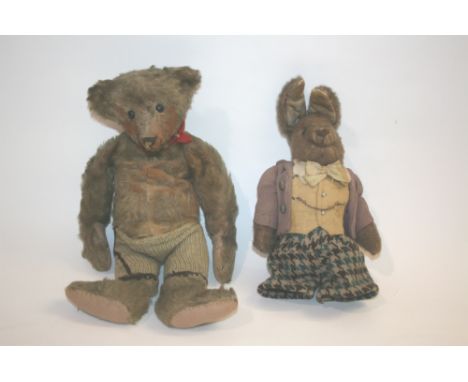 EARLY TEDDY BEAR possibly by Steiff, with boot button eyes and long limbs. Also with an American made soft toy Rabbit dressed