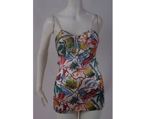 1940'S SATIN BATHING COSTUME A halter neck, satin West Indian print, bathing costume. Labelled 'made in England' Size 34. (1)