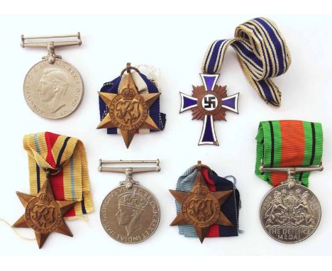 Assortment of various WW2 medals and ribbons to include German Mother cross. Unfortunately we are not doing condition reports