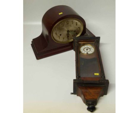 A mahogany mantle clock and a wall clock. Unfortunately we are not doing condition reports on this sale.