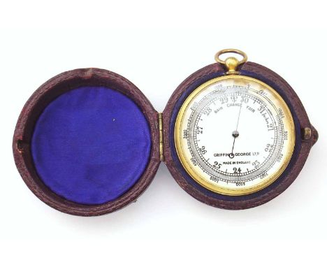 "Griffin & George Ltd" English made pocket barometer, gilt metal case, contained in a maroon leather travel case. Unfortunate