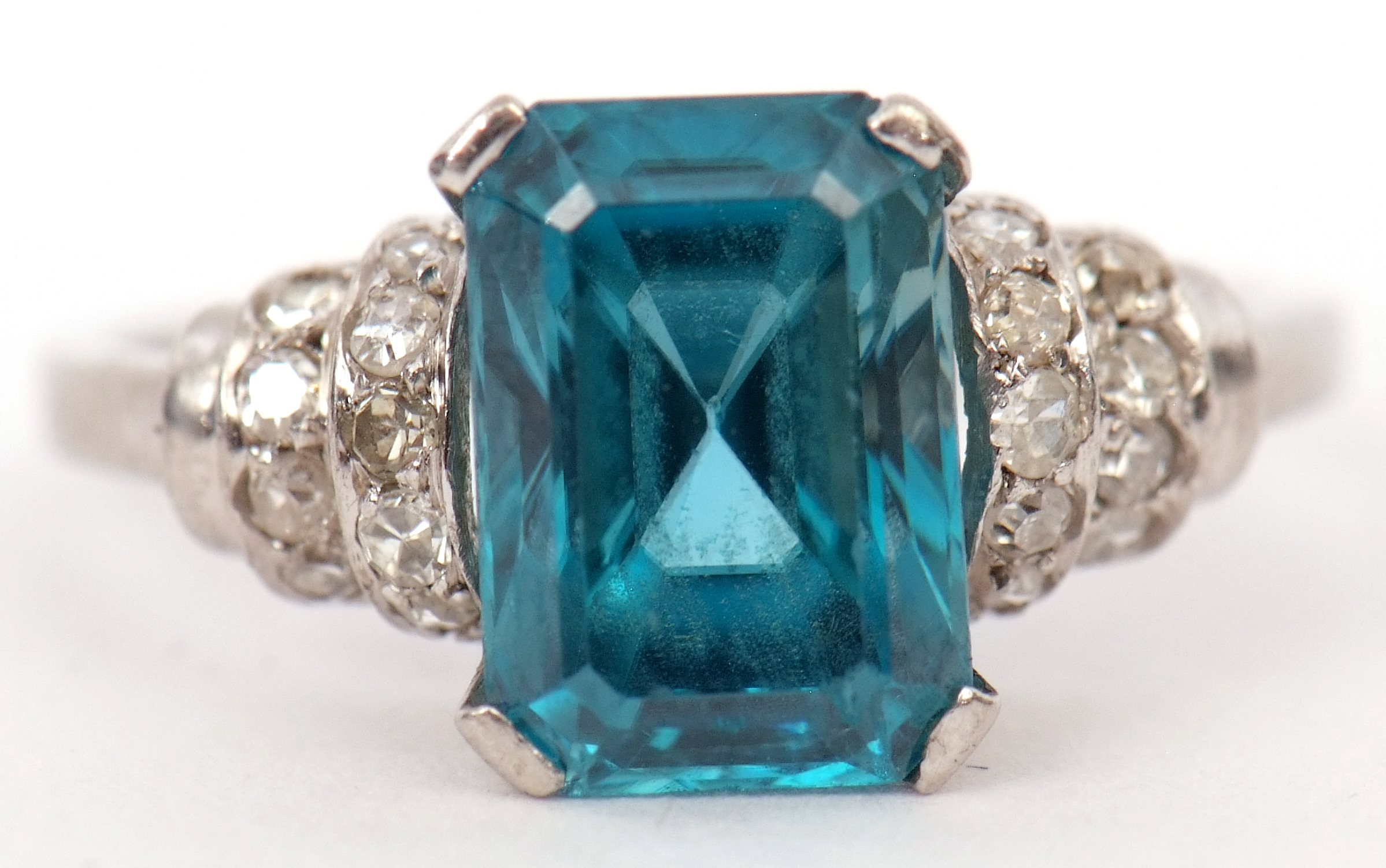 Precious metal blue zircon and diamond ring, the emerald cut zircon ...