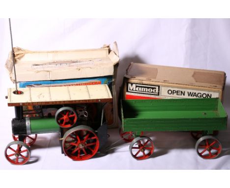 Mamod TW1a steam tractor and accompanying OW1 open wagon, both boxed.
