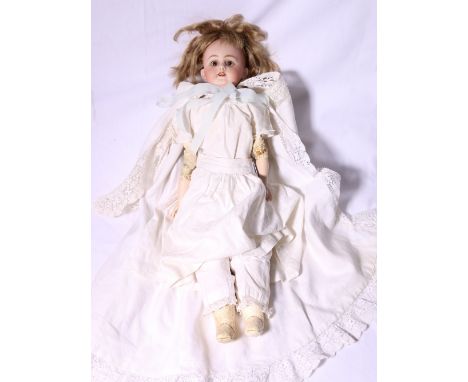German bisque head doll with jointed kid limbs and body and porcelain lower arms, 46cm.