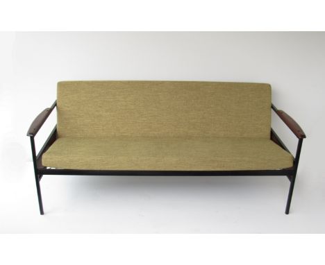 A 1960's Studio sofa, squared metal framed with teak armrests and newly upholstered seat pads in pistachio wool.  163cm x 70c