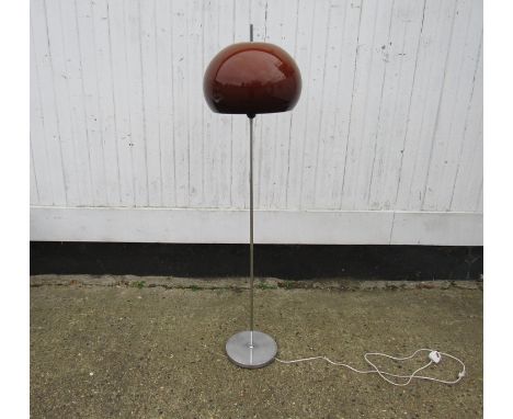 A chromed standard lamp with tan plastic large mushroom shade