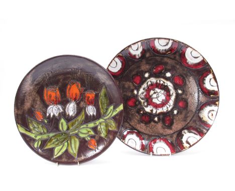 Two West German wall hanging ceramic chargers.  36cm and 29cm diameter  