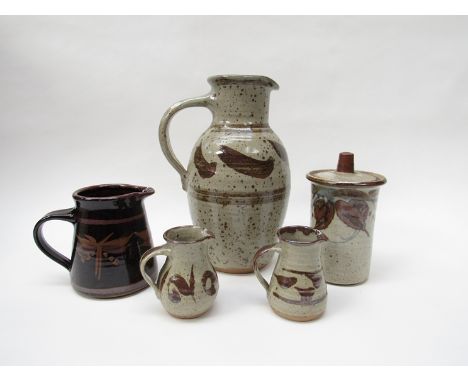 Collection of four studio pottery jugs and a lidded jar in the David Leach style.  Tallest 28cm
