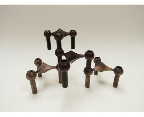 Four bronze modular Nagel candle holders, West German 