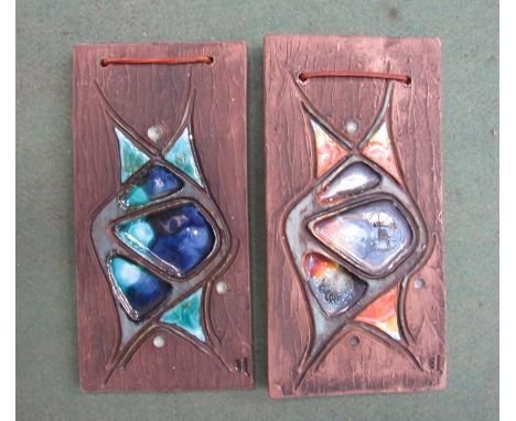 A pair of 1960's Swedish ceramic wall plaques with abstract decoration by Tilemans, 25cm x 12.5cm