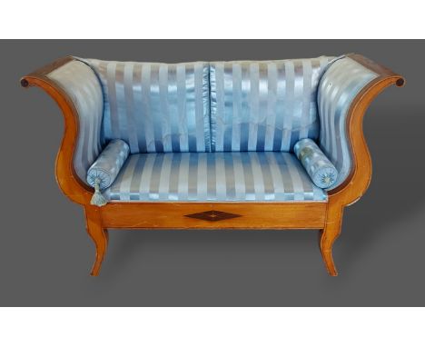 A 19th Century French boudoir sofa with shaped scroll ends above an inlaid frieze raised upon outswept legs, 153cms wide 