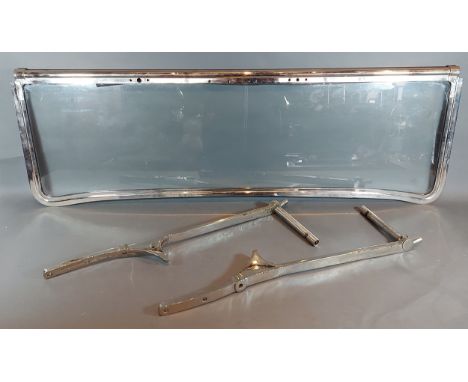 A Lea - Francis chrome and glass windscreen, K or P type with chrome mounting brackets, 101cms wide 