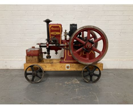 An Amanco Hiredman 2¼HP stationary engineserial number 111656, painted scarlet with yellow lining and lettering, single horiz