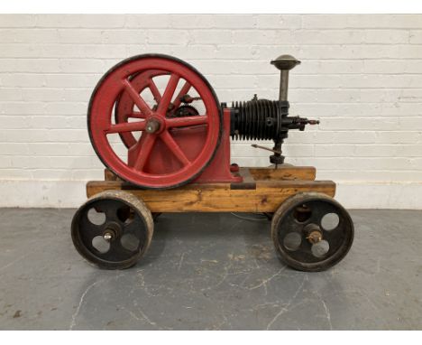 An Amanco 2½HP Stationary engine by Associated manufacturers Co. of Waterloo IOWA U.S.Anumber 158187, painted scarlet with ma