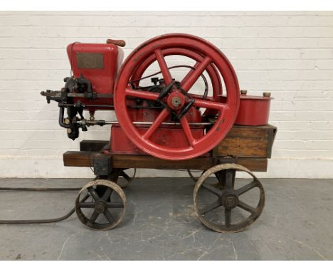 A 3 Mule Team 3HP 'Chore Boy Line' stationary engine by Associated manufacturers Co. of Waterloo IOWA U.S.Anumber 504175, mak
