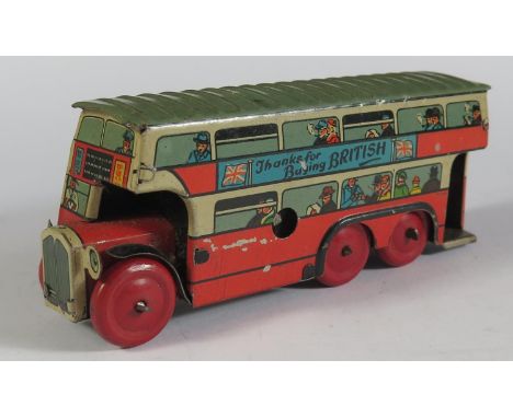 A Wells Brimtoy Tinplate 6 Wheeled Double Deck Bus. Working but no key. (10.5cm approx). 