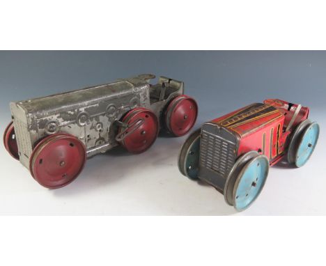 A Scarce Marx Clockwork Tinplate 6 Wheeled Tractor with working motor and one other Marx 4 wheeled tractor. 