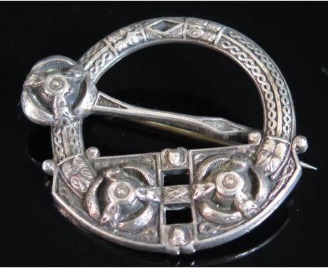 An Irish White Metal Celtic Brooch, the back marked West &amp; Son College Green Dublin Registered Decr. 17th 1849, 40,, diam