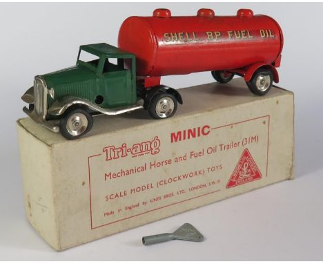 A Triang Minic Clockwork 31M Mechanical Horse and Fuel Oil Tanker in green and red "SHELL BP FUEL OIL". Working motor. In ori
