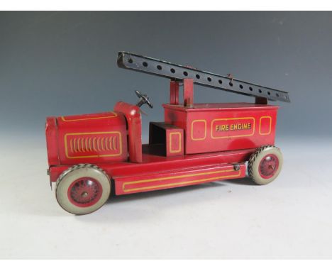 A Chad Valley Ubuilda Tinplate Fire Engine (21cm approx), motor works. 
