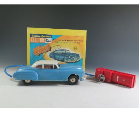 A Marx Battery Operated Electric Car in Blue and White in it's original box Made in Britain (Untested). 