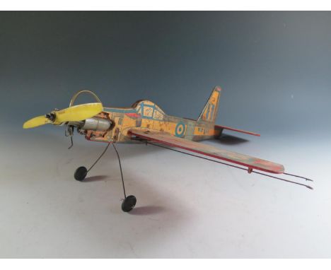 An Unusual Vintage Wooden Airplane with untested engine (46cm approx wingspan). 