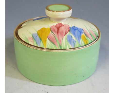 A Clarice Cliff Crocus Pattern Lidded Preserve Jar, 10cm diam. Slight losses to decoration. 