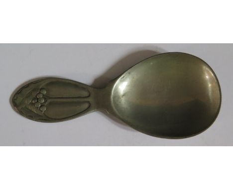 A Liberty TUDRIC Pewter Caddy Spoon decorated with holly and berries, model 01244, 10cm long 