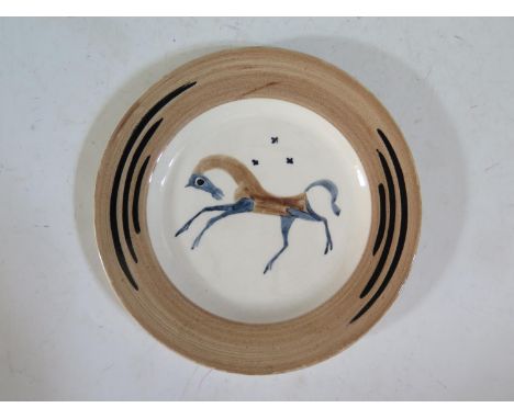A Clarice Cliff 'Chevaux' or 'Chaldean' Plate, designed by John Armstrong and produced by Clarice Cliff for the 1934 Harrods 