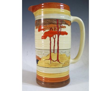 A Rare Clarice Cliff Bizarre Lynton Jug decorated in the Coral Firs pattern, 28.5cm, 1933-39. Slight manufacture faults, very