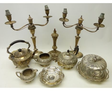 Pair Victorian Sheffield plate two branch candelabra converted to electric, Art Nouveau cast metal candlestick base with scro