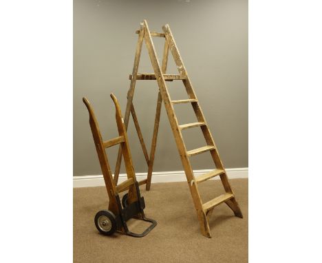 Early 20th century folding step ladders and a wooden sack barrow   Condition Report   Click here for further images, conditio