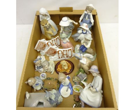 Collection of twelve Nao figurines with two Nao stands, Lilliput Lane etc in one box   Condition Report   Click here for furt