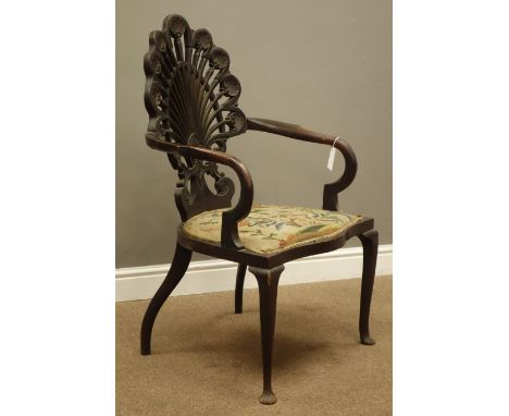 Edwardian mahogany armchair, shaped pierced fan back carved with shells, scrolled arms, serpentine seat, cabriole supports, W