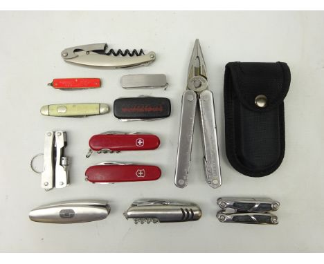 Collection of penknives including; Leatherman 'Core' multitool, two Swiss Army knives, vintage penknife and other penknives i