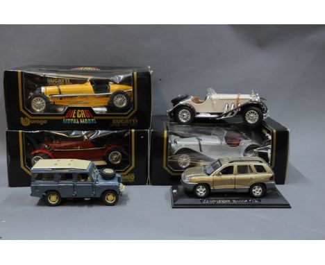 A group of 3 Burago 1/18 scale diecast model cars and 3 other large scale cars 