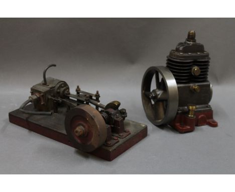 A metal stationary engine raised on an oak plinth, measuring 25cm long, and a metal compressor, measuring 18.5cm high