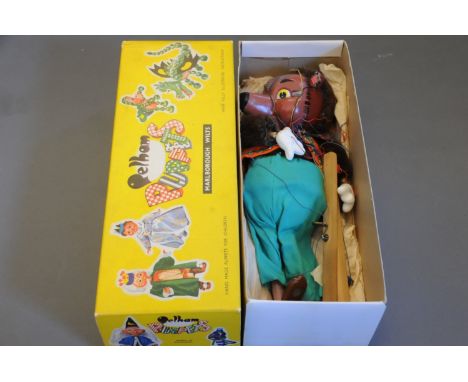 A 1960's "Father Bear" Pelham puppet, SL range, having moulded head with painted features, yellow eyes, and wearing an orange
