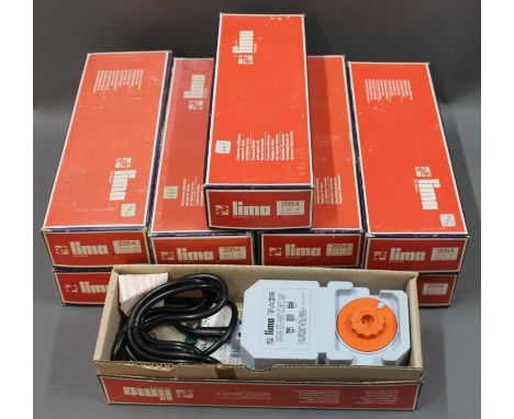 A group of 10 Lima HO Scale VA transformers, all boxed 