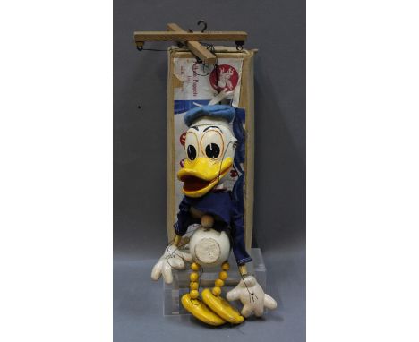 A Walt Disney Donald Duck Pelham Puppet, SL Range, having moulded head, Disney hands and felt hat