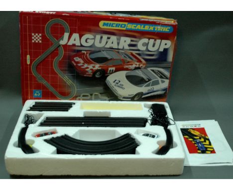A boxed Micro scalextric Jaguar cup racing set 