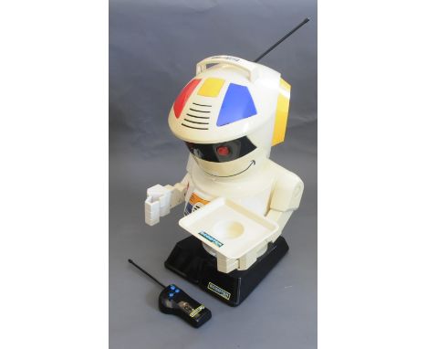 A 1980's retro Scooter 2000 robot, having remote control, and in working order