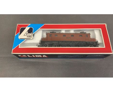An unusual LIMA HO Gauge double ended overhead electric engine no. 208118 with twin pantographs. Brown Livery, good condition