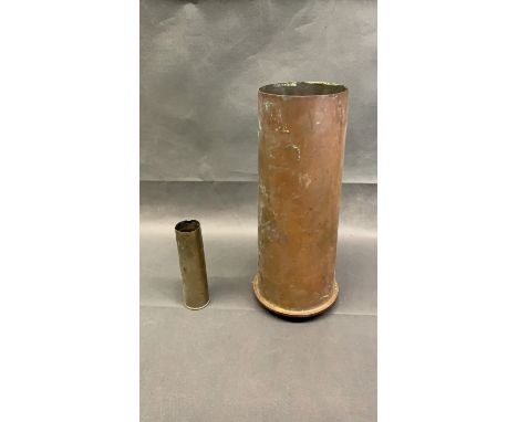 A large brass ammunition shell, 35cm high and 16cm diameter