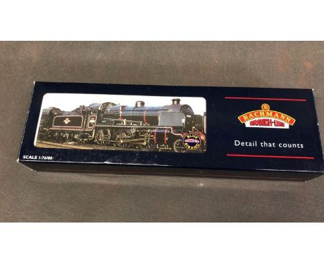 Bachmann 00 Gauge BR N class 2-6-0 with 6 wheel slope side tender in BR black livery. Boxed and in V good condition