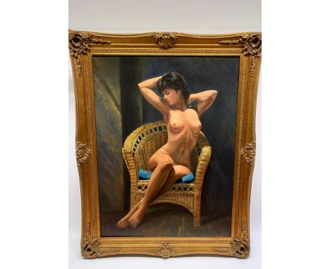 A large decorative vintage oil on canvas depicting a seating nude lady in gilt frame. Signed 1973 R. Evans  Size of canvas 92